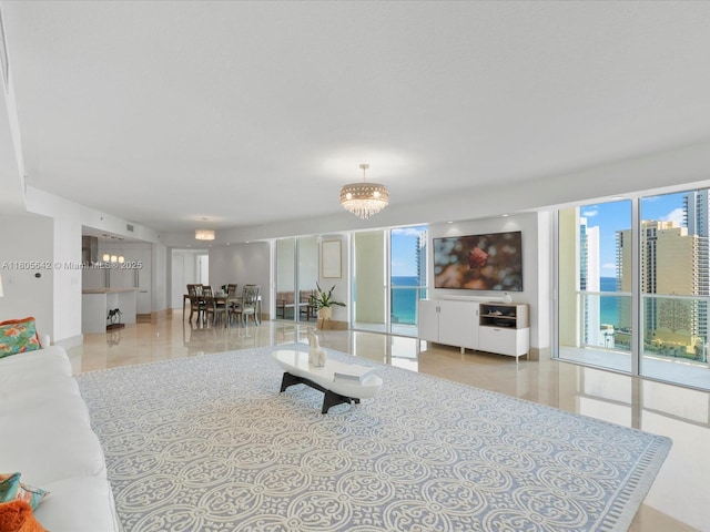 200 Sunny Isles Blvd Unit 2-Uph3, Sunny Isles Beach, FL 33160 - living room with healthy amount of natural light, tile patterned floors, and a chandelier