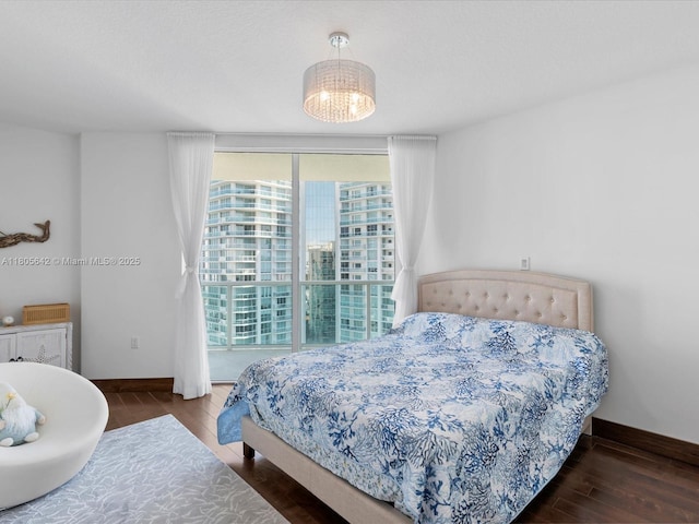 200 Sunny Isles Blvd Unit 2-Uph3, Sunny Isles Beach, FL 33160 - bedroom featuring wood finished floors and baseboards
