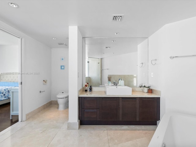 200 Sunny Isles Blvd Unit 2-Uph3, Sunny Isles Beach, FL 33160 - ensuite bathroom with toilet, a bathtub, vanity, and recessed lighting