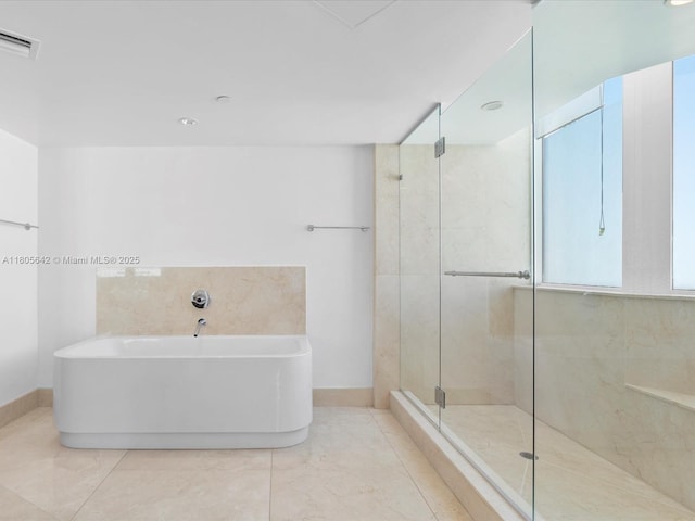 200 Sunny Isles Blvd Unit 2-Uph3, Sunny Isles Beach, FL 33160 - full bath with a soaking tub, a shower stall, and baseboards