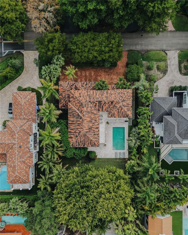 drone / aerial view of a pool