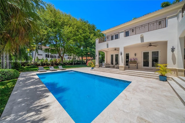 7120 Mira Flores Ave, Coral Gables, FL 33143 - swimming pool with french doors, a ceiling fan, and a patio area