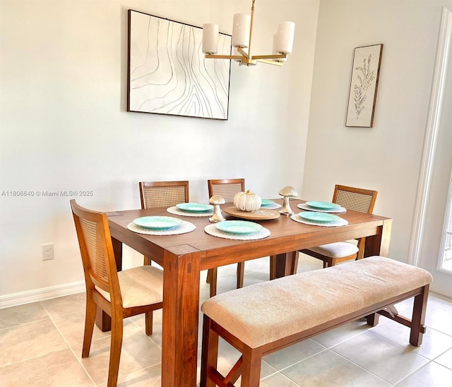 726 Longboat, Davenport, FL 33896 - dining area with light tile patterned floors and a chandelier