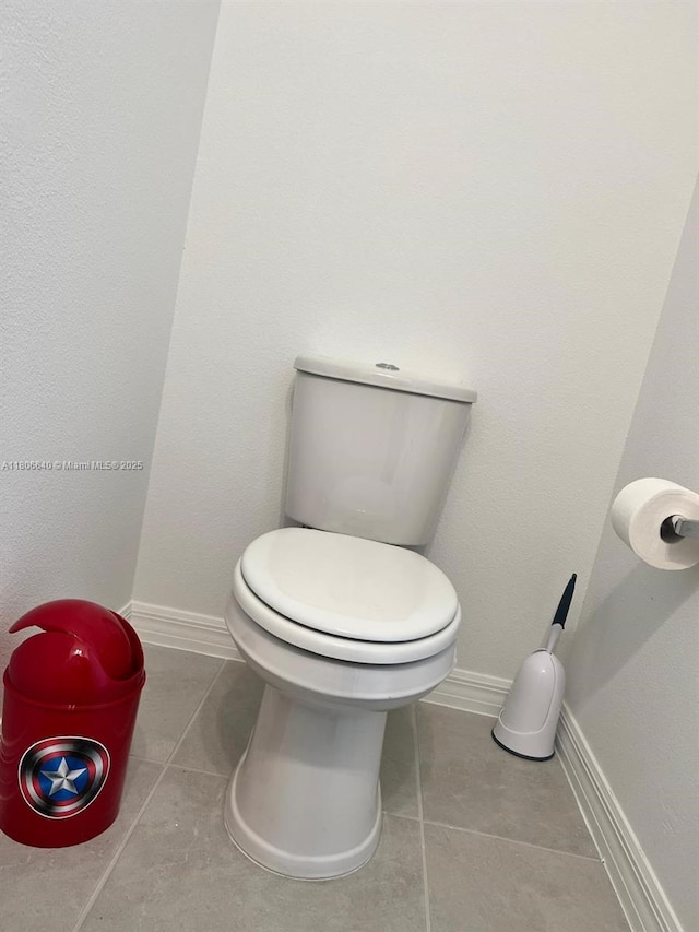 726 Longboat, Davenport, FL 33896 - bathroom with tile patterned flooring and toilet