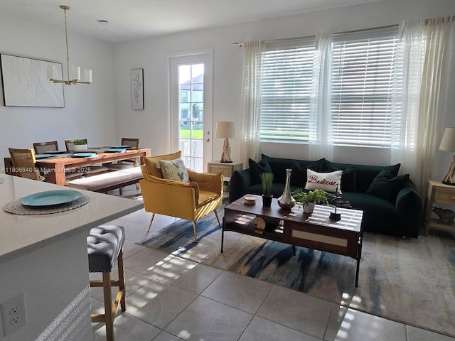 726 Longboat, Davenport, FL 33896 - tiled living room featuring a chandelier