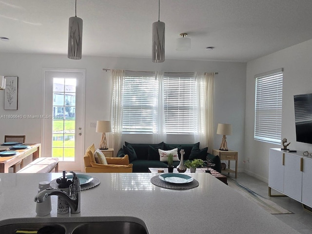 726 Longboat, Davenport, FL 33896 - kitchen with a sink and hanging light fixtures