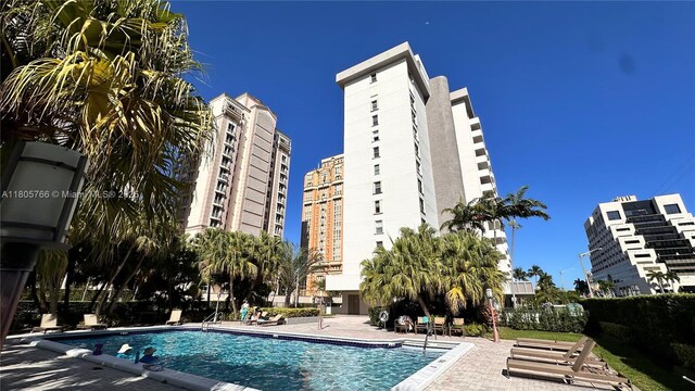 625 Biltmore Way Unit 707, Coral Gables, FL 33134 - community pool featuring a patio