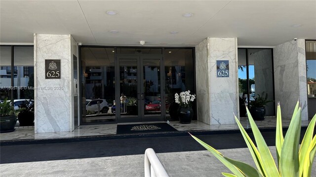 625 Biltmore Way Unit 707, Coral Gables, FL 33134 - view of exterior entry featuring french doors