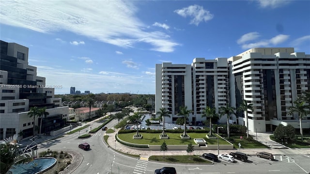 625 Biltmore Way Unit 707, Coral Gables, FL 33134 - view of building exterior featuring uncovered parking and a view of city