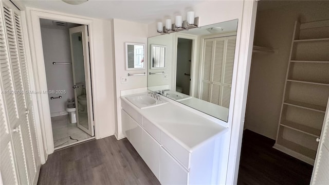 625 Biltmore Way Unit 707, Coral Gables, FL 33134 - bathroom with wood finished floors and vanity