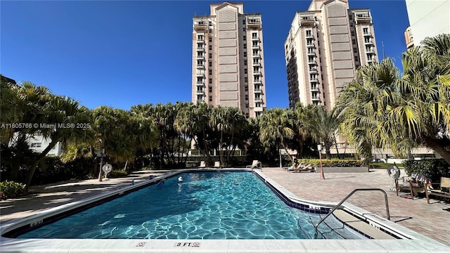 625 Biltmore Way Unit 707, Coral Gables, FL 33134 - community pool featuring a patio