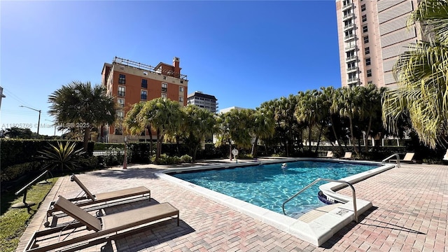 625 Biltmore Way Unit 707, Coral Gables, FL 33134 - community pool with a patio