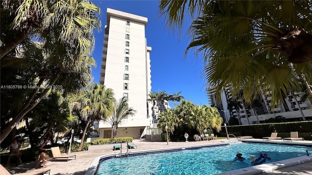 625 Biltmore Way Unit 707, Coral Gables, FL 33134 - community pool featuring a patio area