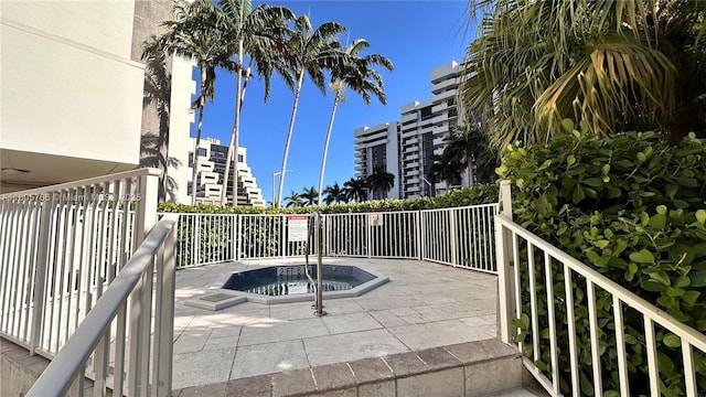 625 Biltmore Way Unit 707, Coral Gables, FL 33134 - view of patio with a hot tub