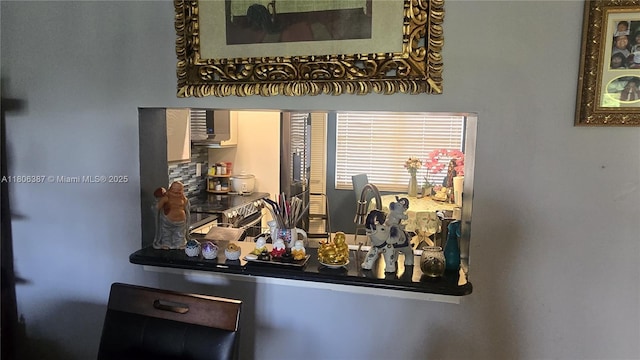 12500 SW 5th Ct Unit 307M, Pembroke Pines, FL 33027 - detailed view of tasteful backsplash and electric stove