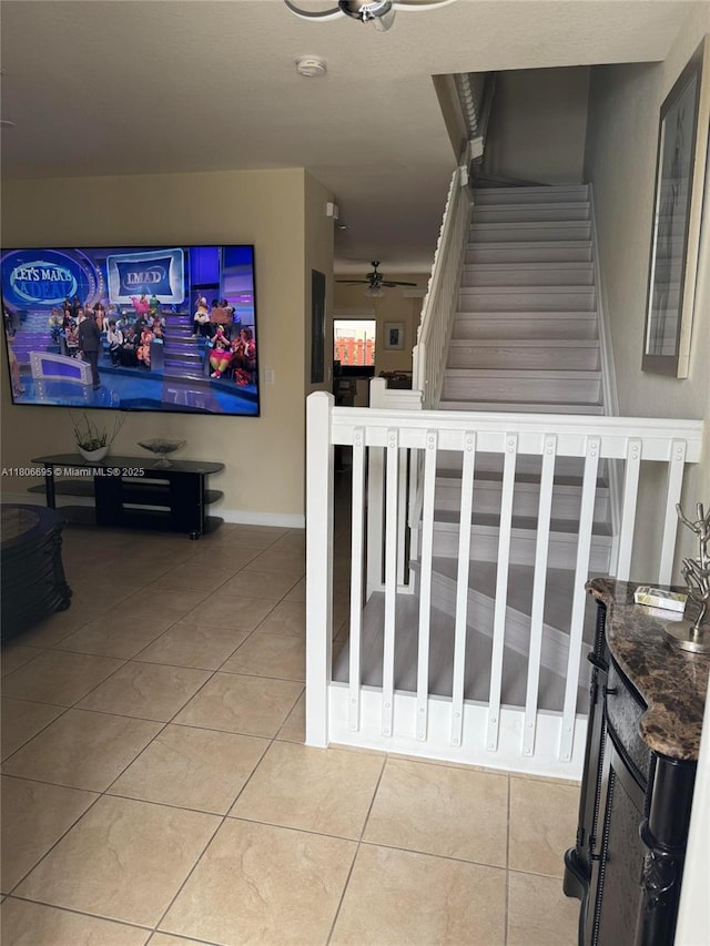 11564 SW 151st Ave, Miami, FL 33196 - stairway with a ceiling fan, tile patterned flooring, and baseboards