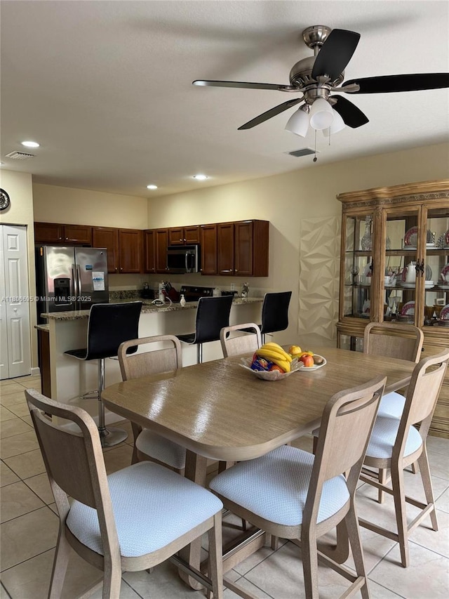 11564 SW 151st Ave, Miami, FL 33196 - dining area with light tile patterned flooring, ceiling fan, and recessed lighting
