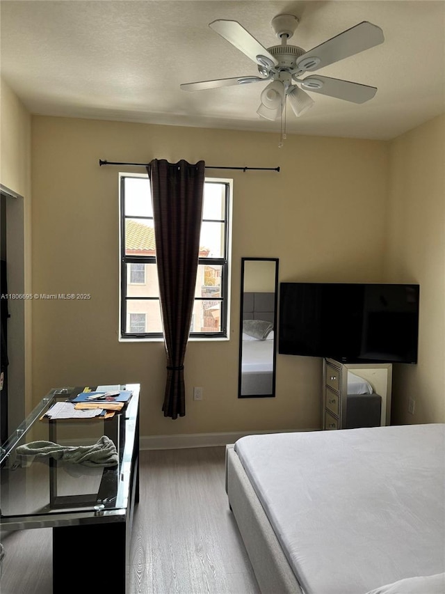 11564 SW 151st Ave, Miami, FL 33196 - bedroom featuring wood finished floors, baseboards, and a ceiling fan
