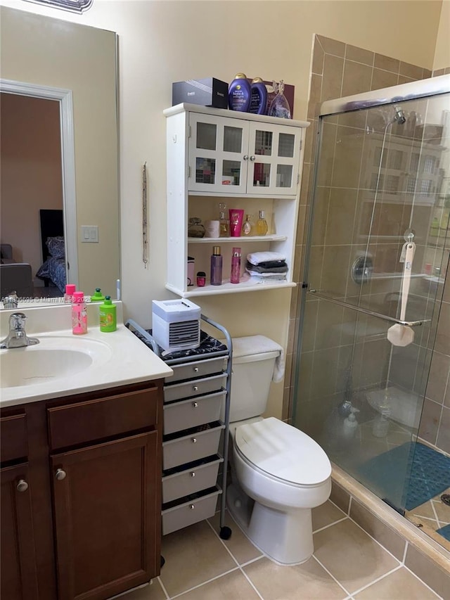 11564 SW 151st Ave, Miami, FL 33196 - full bathroom with a shower stall, tile patterned flooring, toilet, and vanity