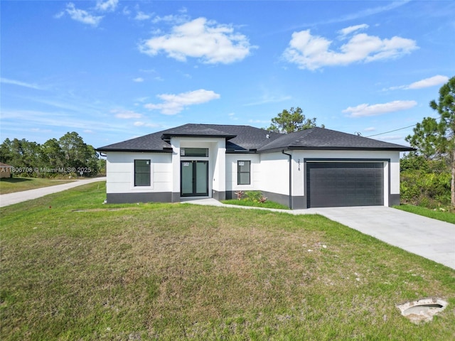 2518 26th St W, Lehigh Acres, FL 33971 - view of front of property with a garage, concrete driveway, stucco siding, a front yard, and french doors