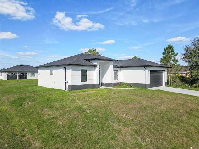 2518 26th St W, Lehigh Acres, FL 33971 - view of front of home featuring concrete driveway, stucco siding, a garage, and a front yard