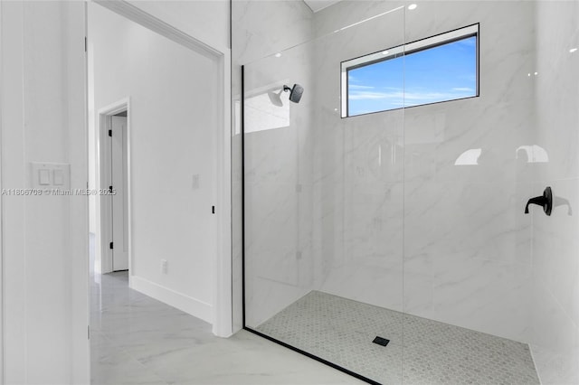 2518 26th St W, Lehigh Acres, FL 33971 - bathroom with marble tiled flooring, a marble finish shower, and baseboards