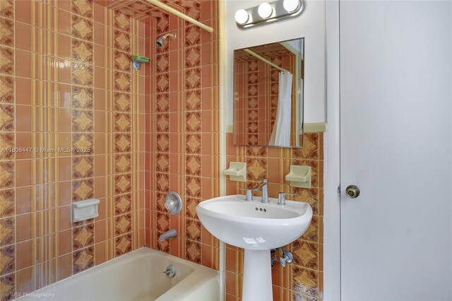 1727 SW 11th Ter, Miami, FL 33135 - full bathroom with tile walls, shower / tub combo with curtain, and tasteful backsplash