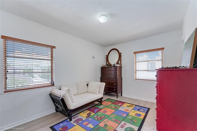1727 SW 11th Ter, Miami, FL 33135 - bedroom featuring light wood-style floors and baseboards