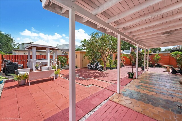 1727 SW 11th Ter, Miami, FL 33135 - fenced backyard with a gazebo and a patio