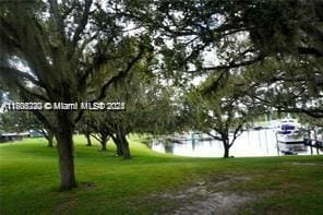 1818 Inwood Rd, La Belle, FL 33935 - view of property's community featuring a water view and a yard