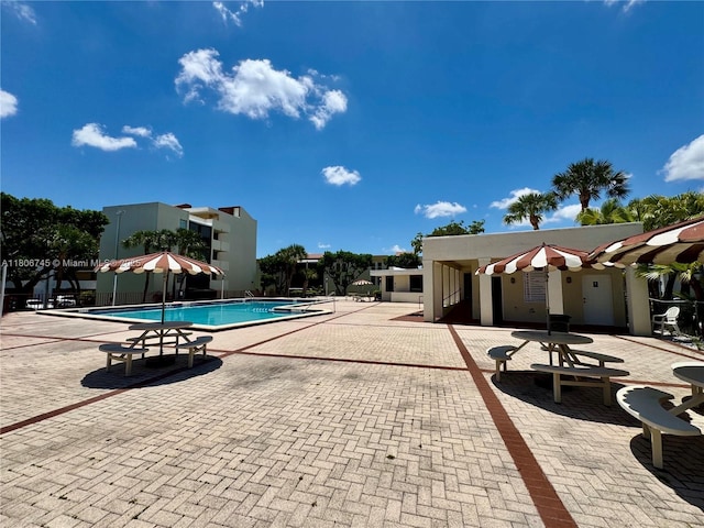 8810 Fontainebleau Blvd Unit 318, Miami, FL 33172 - community pool featuring a patio area