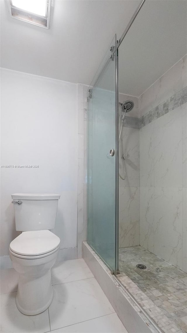 8605 W Sample Rd Unit 202, Coral Springs, FL 33065 - full bath featuring marble look tiles, a shower stall, and toilet