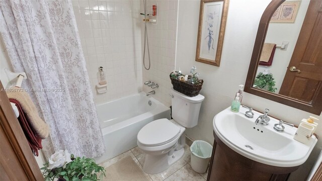 8605 W Sample Rd Unit 202, Coral Springs, FL 33065 - full bathroom with toilet, shower / tub combo with curtain, vanity, and tile patterned flooring