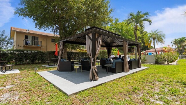 8605 W Sample Rd Unit 202, Coral Springs, FL 33065 - view of patio / terrace with a gazebo and an outdoor hangout area