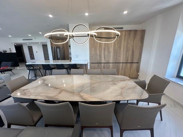 19500 Turnberry Way Unit 12A, Aventura, FL 33180 - dining area with light marble finish floors and recessed lighting