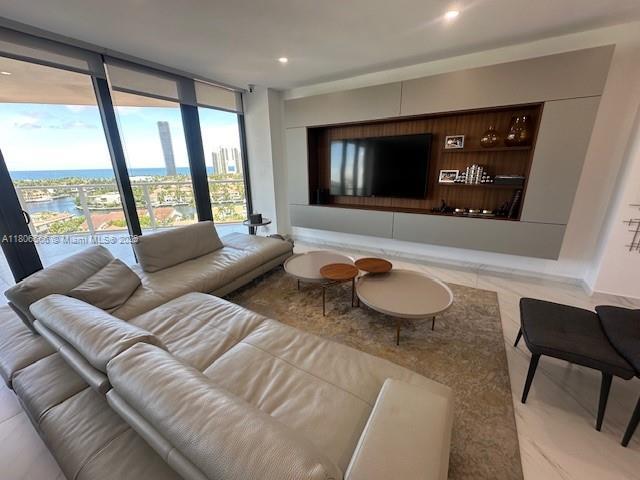 19500 Turnberry Way Unit 12A, Aventura, FL 33180 - living area with floor to ceiling windows, built in features, and recessed lighting