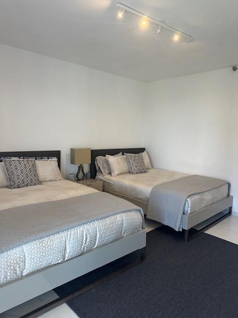 19500 Turnberry Way Unit 12A, Aventura, FL 33180 - bedroom with track lighting