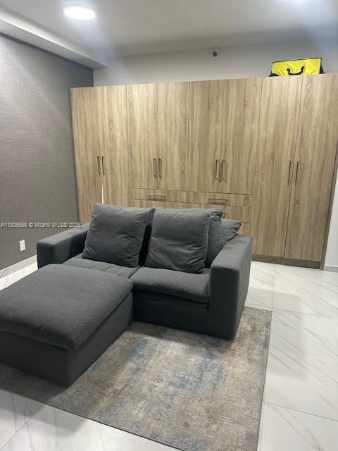 19500 Turnberry Way Unit 12A, Aventura, FL 33180 - living room featuring light marble finish floors