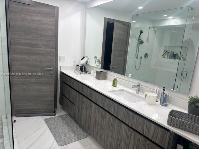 19500 Turnberry Way Unit 12A, Aventura, FL 33180 - full bath featuring a stall shower, double vanity, and recessed lighting