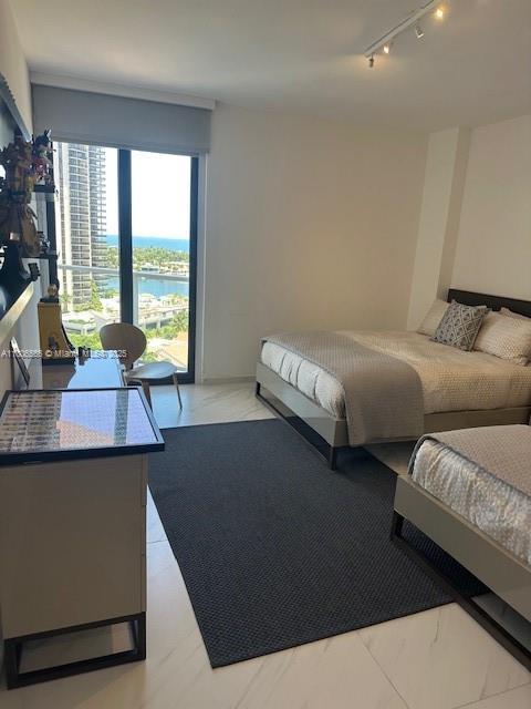 19500 Turnberry Way Unit 12A, Aventura, FL 33180 - bedroom with track lighting