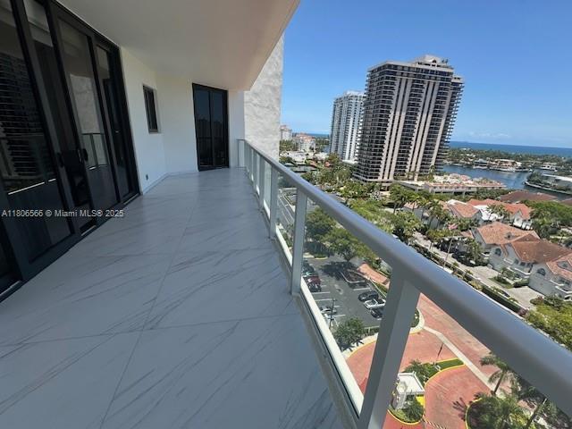 19500 Turnberry Way Unit 12A, Aventura, FL 33180 - balcony featuring a view of city and a water view
