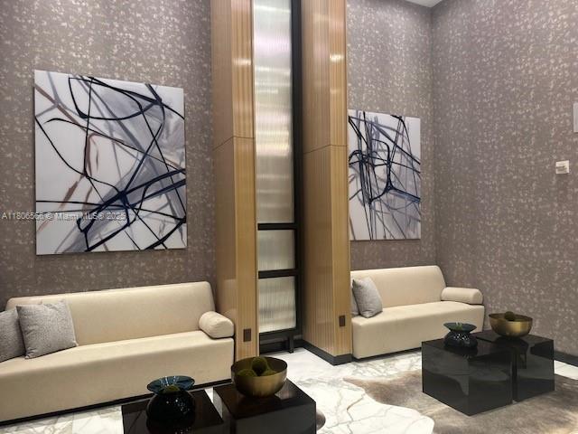 19500 Turnberry Way Unit 12A, Aventura, FL 33180 - community lobby featuring wallpapered walls