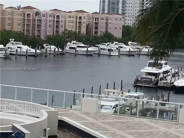 19500 Turnberry Way Unit 12A, Aventura, FL 33180 - dock featuring a water view and view of marina