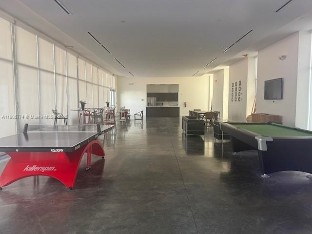 15051 Royal Oaks Ln Unit 1703, North Miami, FL 33181 - recreation room with concrete flooring and billiards table