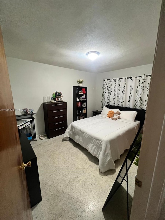 2990 W 7th Ave, Hialeah, FL 33012 - bedroom with a textured ceiling