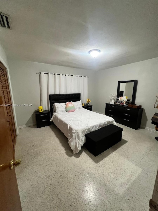 2990 W 7th Ave, Hialeah, FL 33012 - bedroom featuring baseboards