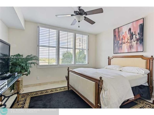 2100 N Ocean Blvd Unit 5B, Fort Lauderdale, FL 33305 - bedroom with baseboards and ceiling fan