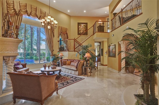10233 NW 66th Dr, Parkland, FL 33076 - living room featuring stairs, marble tiled floors, a chandelier, a towering ceiling, and baseboards