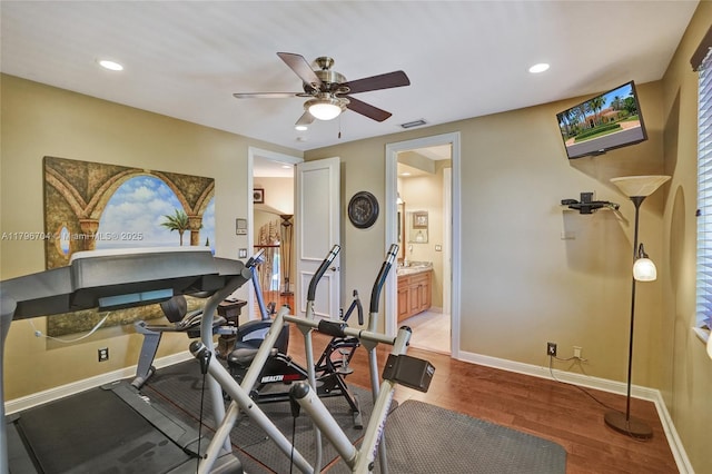10233 NW 66th Dr, Parkland, FL 33076 - exercise room featuring a ceiling fan, wood finished floors, baseboards, and recessed lighting