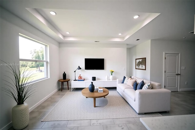 2022 Granada Rd, La Belle, FL 33935 - living room with a raised ceiling, baseboards, and recessed lighting